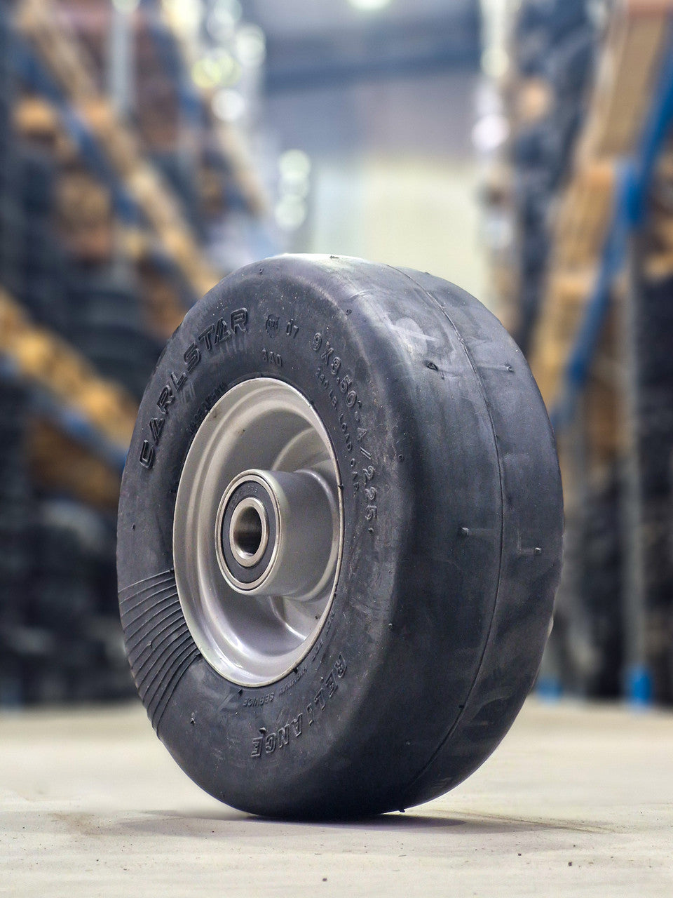 ASSEMBLY - 4"x2.10" Grey Steel Rim, 9/350-4 Solid Smooth Tyre, 20mm 6204 High Speed Bearings, (Reliance) (Mower Decks), (Pre-assembled)